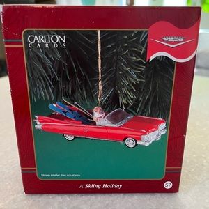 A skiing holiday ornament. Nib. Carlton Card.